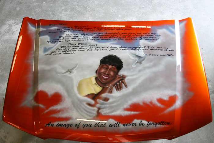 portrait on chevy hood